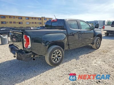Trzecie zdjęcie samochodu z tyłu: 2016 GMC CANYON SLE VIN:1GTG6CE35G1317553 - miniatura