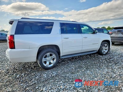 Trzecie zdjęcie samochodu z tyłu: 2016 CHEVROLET SUBURBAN C1500 LTZ VIN:1GNSCJKC9GR429776 - miniatura