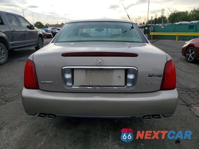 Zdjęcie 6 z 12 samochodu: 2004 CADILLAC DEVILLE DHS VIN:1G6KE54Y34U119783 - miniatura