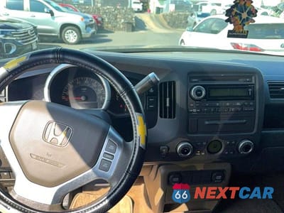 Zdjęcie 9 z 10 samochodu: 2006 HONDA RIDGELINE RT VIN:2HJYK16286H570811 - miniatura