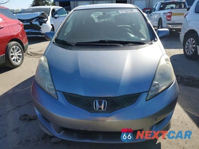 Piąte zdjęcie samochodu w środku: 2010 HONDA FIT SPORT VIN:JHMGE8H46AS027665 - miniatura
