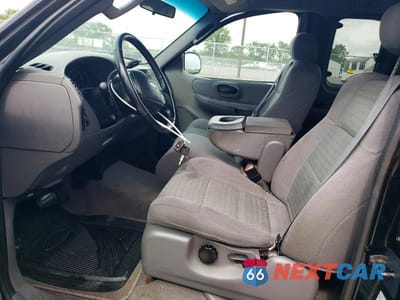 Zdjęcie 7 z 12 samochodu: 2002 FORD F150 VIN:2FTRX18W52CA91084 - miniatura
