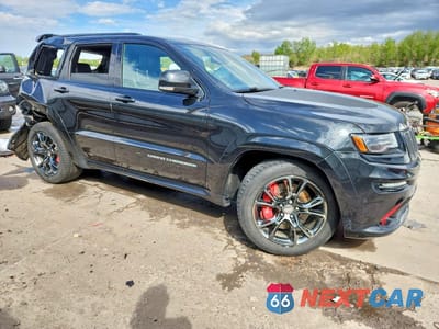 Czwarte zdjęcie samochodu z boku: 2016 JEEP GRAND CHEROKEE SRT-8 VIN:1C4RJFDJ6GC301097 - miniatura
