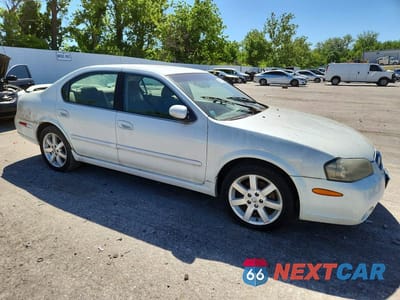 Czwarte zdjęcie samochodu z boku: 2002 NISSAN MAXIMA GXE VIN:JN1DA31D82T420756 - miniatura