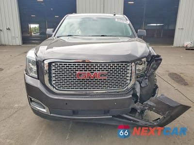 Piąte zdjęcie samochodu w środku: 2016 GMC YUKON DENALI VIN:1GKS2CKJ7GR346065 - miniatura