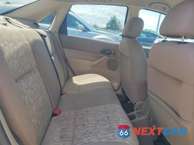 Zdjęcie 10 z 12 samochodu: 2005 FORD FOCUS ZX4 VIN:1FAFP34N35W232812 - miniatura