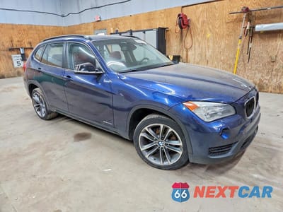 Czwarte zdjęcie samochodu z boku: 2014 BMW X1 XDRIVE28I VIN:WBAVL1C50EVY20418 - miniatura