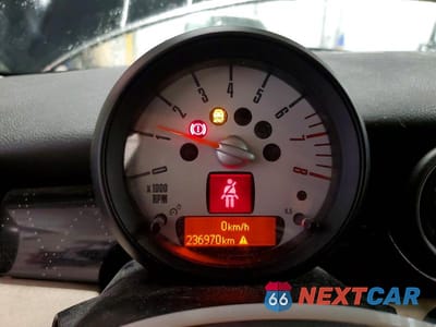 Zdjęcie 9 z 13 samochodu: 2012 MINI COOPER VIN:WMWSU3C57CT369637 - miniatura