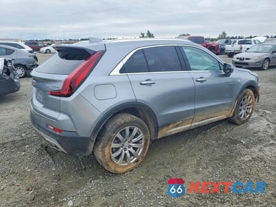 Trzecie zdjęcie samochodu z tyłu: 2023 CADILLAC XT4 PREMIUM LUXURY VIN:1GYFZCR40PF157990 - miniatura