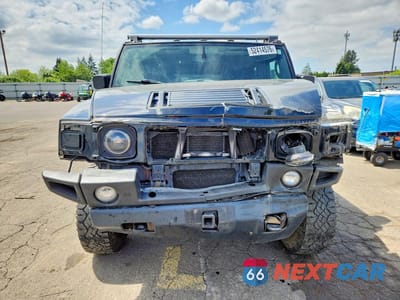 Piąte zdjęcie samochodu w środku: 2005 HUMMER H2 VIN:5GRGN23U65H110648 - miniatura