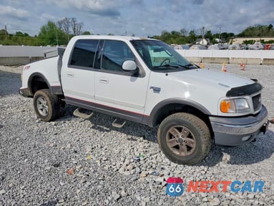 Czwarte zdjęcie samochodu z boku: 2003 FORD F150 SUPERCREW VIN:1FTRW08L53KD94530 - miniatura