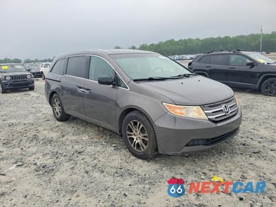 Czwarte zdjęcie samochodu z boku: 2012 HONDA ODYSSEY EXL VIN:5FNRL5H6XCB118499 - miniatura