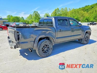 Trzecie zdjęcie samochodu z tyłu: 2019 TOYOTA TACOMA SR5 V6 VIN:3TMCZ5AN7KM250765 - miniatura