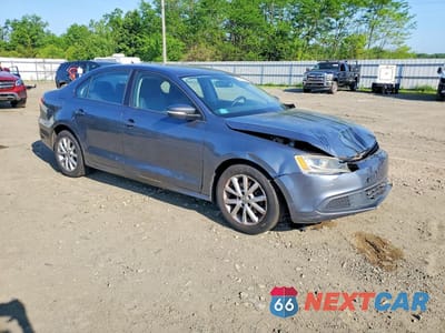 Czwarte zdjęcie samochodu z boku: 2012 VOLKSWAGEN JETTA SE VIN:3VWDP7AJ4CM312575 - miniatura