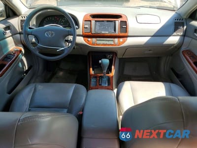 Zdjęcie 8 z 12 samochodu: 2002 TOYOTA CAMRY XLE VIN:4T1BE32K62U565015 - miniatura