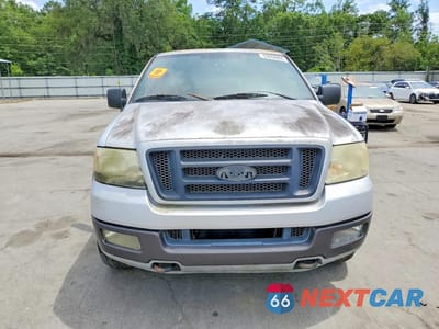 Piąte zdjęcie samochodu w środku: 2004 FORD F150 VIN:1FTPX14524NB59701 - miniatura