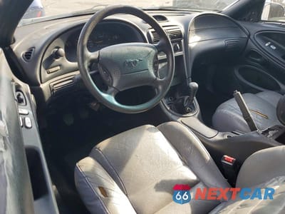 Zdjęcie 8 z 12 samochodu: 1996 FORD MUSTANG VIN:1FALP4042TF170001 - miniatura