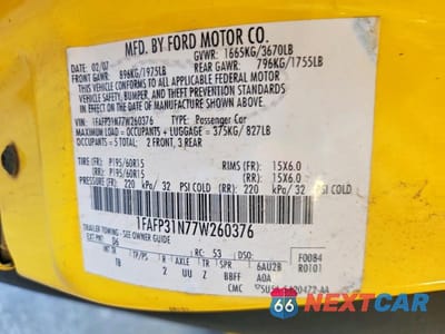Zdjęcie 12 z 12 samochodu: 2007 FORD FOCUS ZX3 VIN:1FAFP31N77W260376 - miniatura