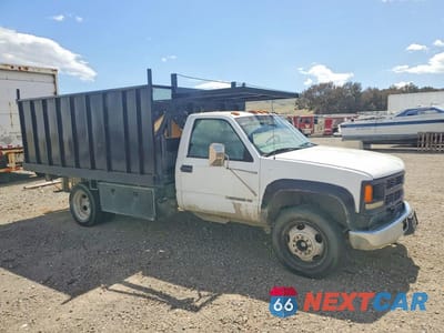 Czwarte zdjęcie samochodu z boku: 2001 CHEVROLET SILVERADO DUMP TRUCK VIN:3GBKC34G51M100073 - miniatura