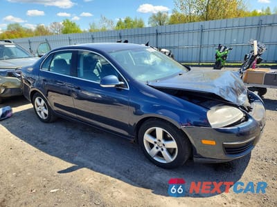 Czwarte zdjęcie samochodu z boku: 2009 VOLKSWAGEN JETTA SE VIN:3VWRZ71K79M076960 - miniatura