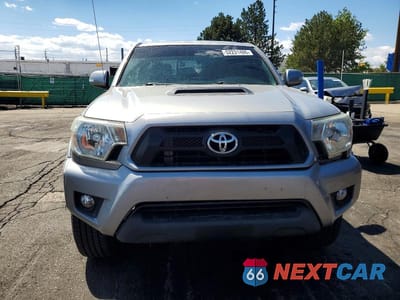 Piąte zdjęcie samochodu w środku: 2015 TOYOTA TACOMA V6 VIN:3TMLU4EN4FM180733 - miniatura