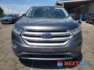 Piąte zdjęcie samochodu w środku: 2016 FORD EDGE SEL VIN:2FMPK4J93GBC10657 - miniatura