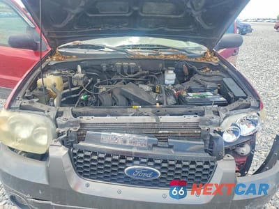 Zdjęcie 12 z 13 samochodu: 2006 FORD ESCAPE XLT VIN:1FMYU03126KA31111 - miniatura