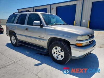 Czwarte zdjęcie samochodu z boku: 2001 CHEVROLET TAHOE K1500 VIN:1GNEK13T61R151294 - miniatura