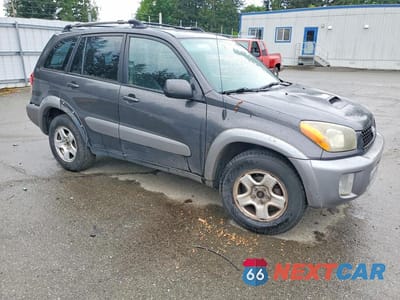 Czwarte zdjęcie samochodu z boku: 2003 TOYOTA RAV4 BASE VIN:JTEGH20V930106235 - miniatura