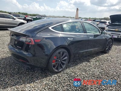 Trzecie zdjęcie samochodu z tyłu: 2020 TESLA MODEL 3 VIN:5YJ3E1EC0LF796181 - miniatura