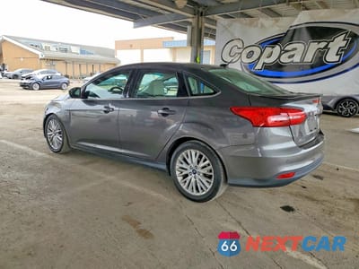 Drugie zdjęcie samochodu z przodu: 2017 FORD FOCUS TITANIUM VIN:1FADP3J20HL288147 - miniatura