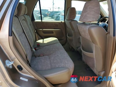 Zdjęcie 11 z 13 samochodu: 2004 HONDA CR-V LX VIN:JHLRD68404C021928 - miniatura