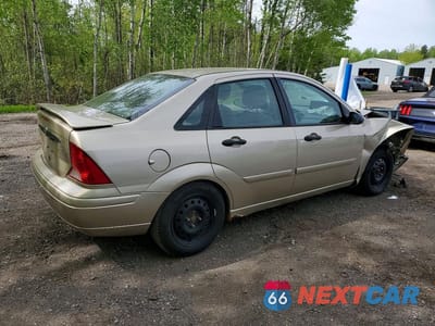 Trzecie zdjęcie samochodu z tyłu: 2000 FORD FOCUS SE VIN:1FAFP34P9YW409160 - miniatura