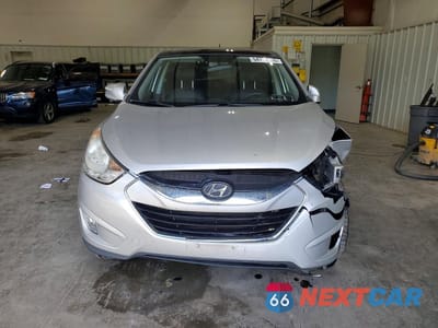 Piąte zdjęcie samochodu w środku: 2011 HYUNDAI TUCSON LIMITED VIN:KM8JUCAC9BU228069 - miniatura