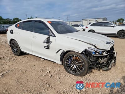 Czwarte zdjęcie samochodu z boku: 2021 BMW X6 M50I VIN:5UXCY8C07M9D95829 - miniatura