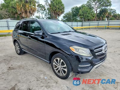 Czwarte zdjęcie samochodu z boku: 2016 MERCEDES-BENZ GLE 350 VIN:4JGDA5JB8GA764061 - miniatura