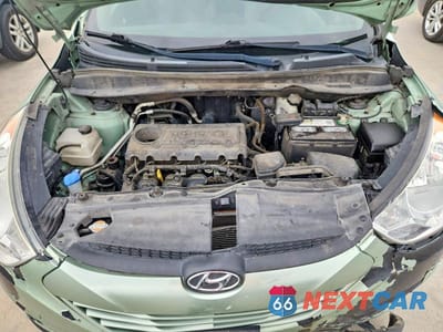 Zdjęcie 12 z 13 samochodu: 2011 HYUNDAI TUCSON GLS VIN:KM8JU3AC7BU125930 - miniatura
