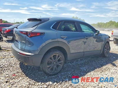 Trzecie zdjęcie samochodu z tyłu: 2023 MAZDA CX-30 PREFERRED VIN:3MVDMBCM9PM548195 - miniatura