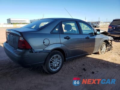 Trzecie zdjęcie samochodu z tyłu: 2007 FORD FOCUS ZX4 VIN:1FAHP34NX7W134484 - miniatura