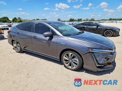 Czwarte zdjęcie samochodu z boku: 2018 HONDA CLARITY VIN:JHMZC5F19JC018040 - miniatura