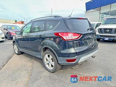 Trzecie zdjęcie samochodu z tyłu: 2014 FORD ESCAPE SE VIN:1FMCU9G98EUC77338 - miniatura