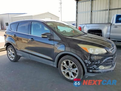 Czwarte zdjęcie samochodu z boku: 2013 FORD ESCAPE SEL VIN:1FMCU9HX5DUC36970 - miniatura