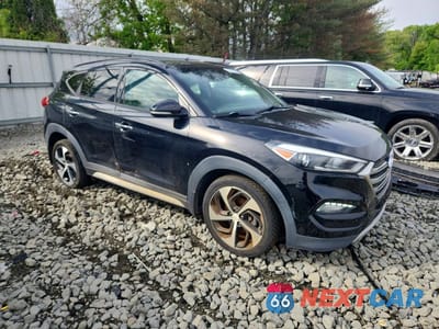 Czwarte zdjęcie samochodu z boku: 2018 HYUNDAI TUCSON LIMITED VIN:KM8J3CA24JU799333 - miniatura