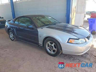 Czwarte zdjęcie samochodu z boku: 2003 FORD MUSTANG VIN:1FAFP40463F424886 - miniatura