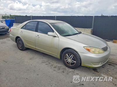 Czwarte zdjęcie samochodu z boku: 2004 TOYOTA CAMRY LE VIN:4T1BE32K64U856570 - miniatura