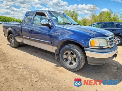 Czwarte zdjęcie samochodu z boku: 2002 FORD F150 VIN:1FTRX172X2NC03645 - miniatura
