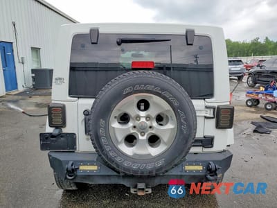 Zdjęcie 6 z 13 samochodu: 2014 JEEP WRANGLER UNLIMITED SAHARA VIN:1C4BJWEG5EL146902 - miniatura