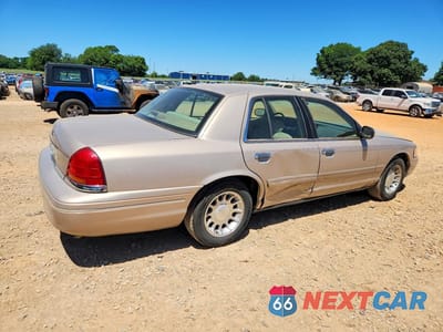 Trzecie zdjęcie samochodu z tyłu: 1998 FORD CROWN VICTORIA LX VIN:2FAFP74W5WX179374 - miniatura
