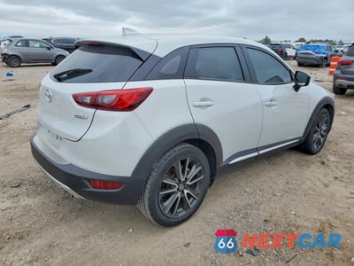 Trzecie zdjęcie samochodu z tyłu: 2016 MAZDA CX-3 GRAND TOURING VIN:JM1DKBD75G0118828 - miniatura