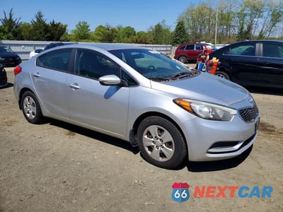 Czwarte zdjęcie samochodu z boku: 2014 KIA FORTE LX VIN:KNAFK4A61E5072766 - miniatura